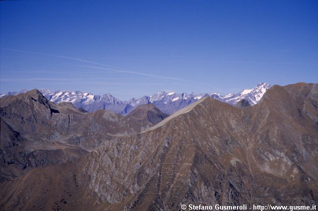  Vista dal monte dei Frati - Corno Stella, Badile, Disgrazia - click to next image