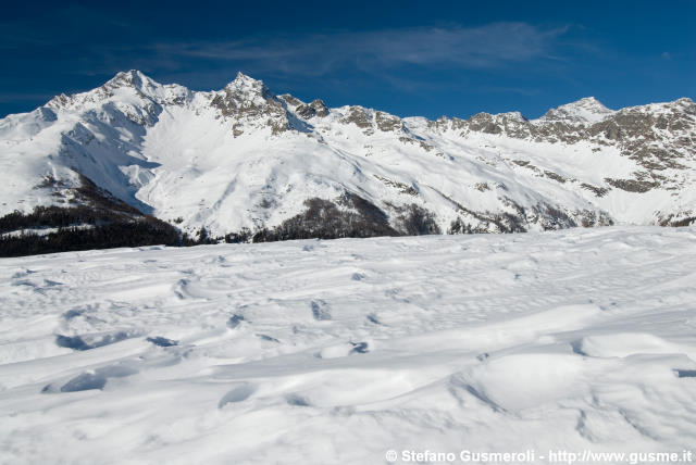  Andossi innevati e cime - click to next image